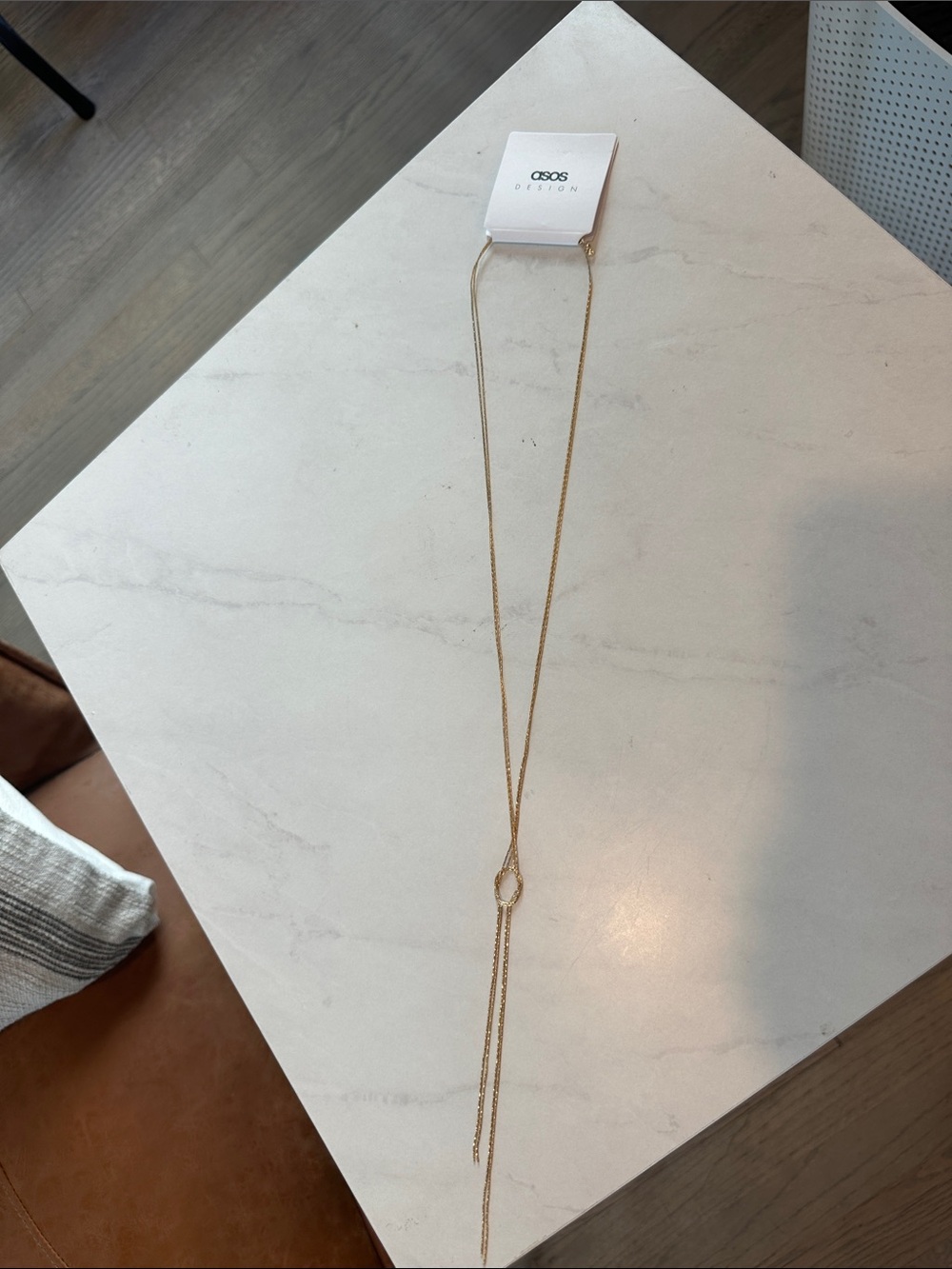 ASOS DESIGN lariat necklace with fine snake knot design in gold tone